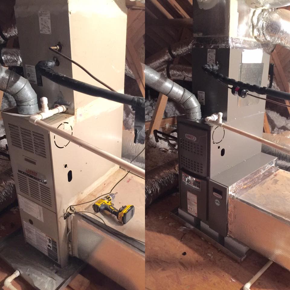 Heating system installation in attic with new and old units side by side.