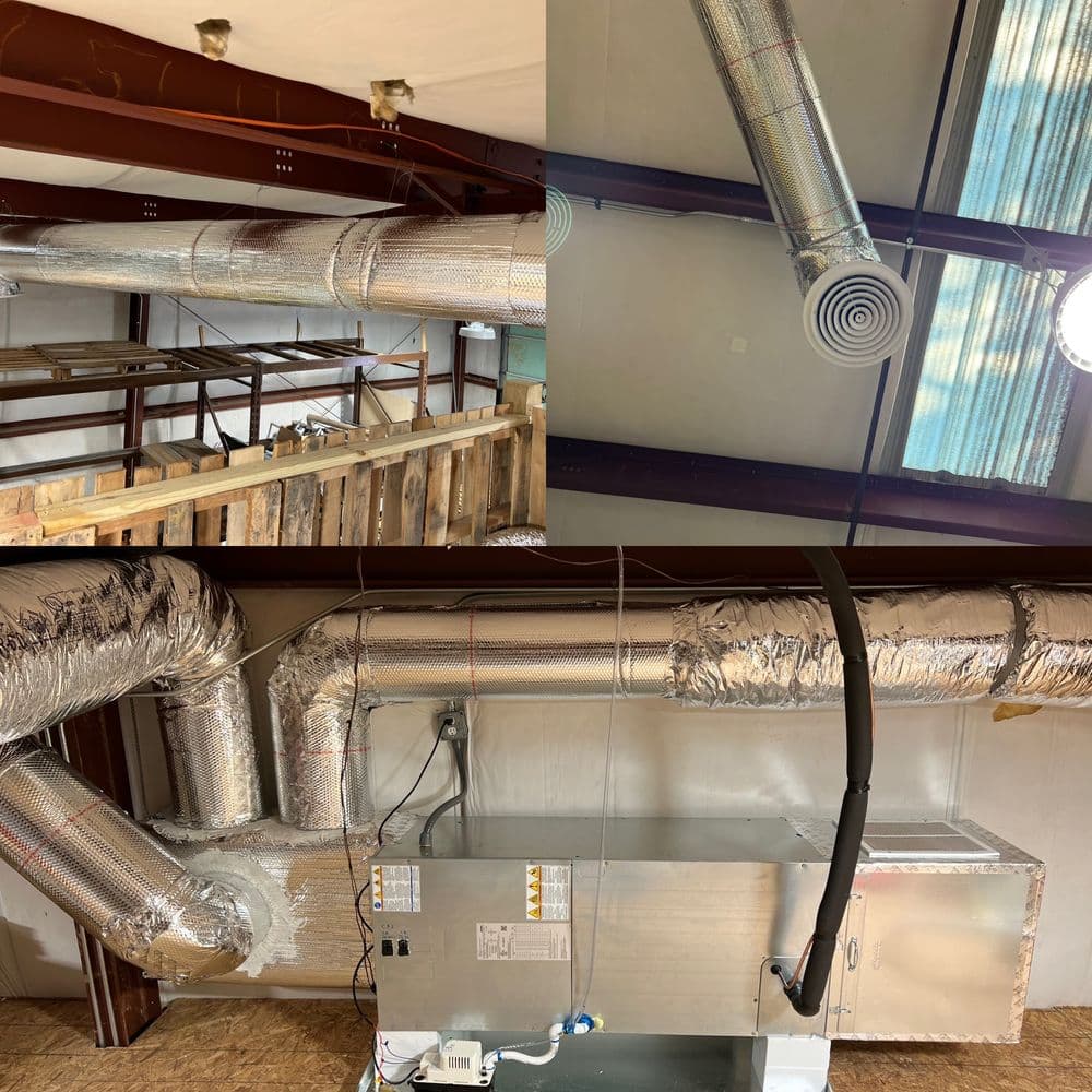 HVAC installation with ductwork and ventilation systems in a commercial space.